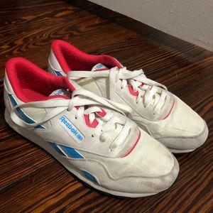 White Reebok’s with red and blue accents